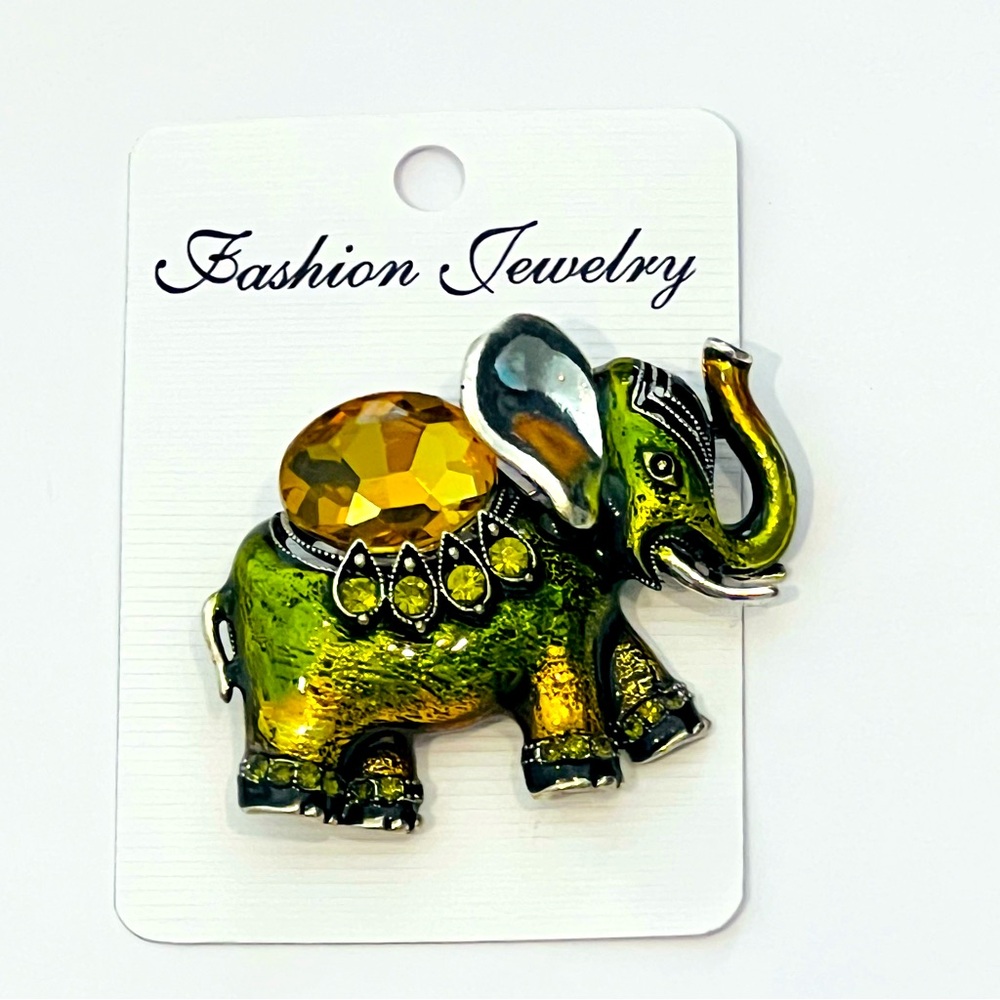 Green elephant brooch